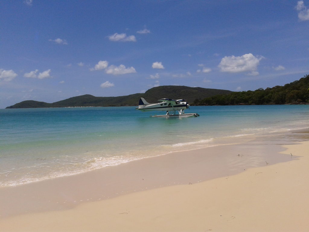 Whitehaven Beach op Whitsunday Island met watervliegtuig