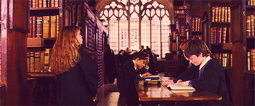 hermione-grainger-at-hogwarts-library-gif